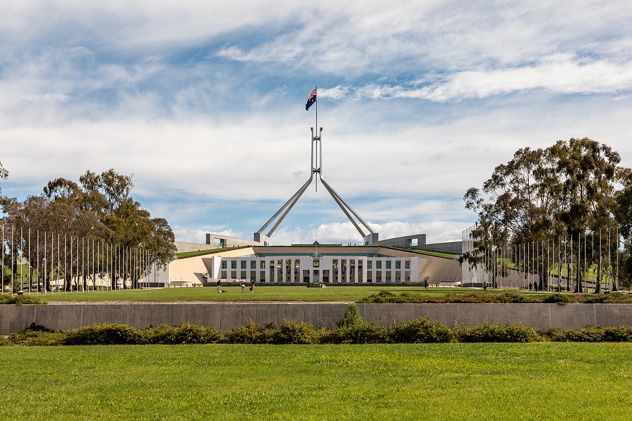 Australian Parliament House in Canberra, where lawmakers may consider the regulatory consequences of an autonomous AI agent entering a government portal