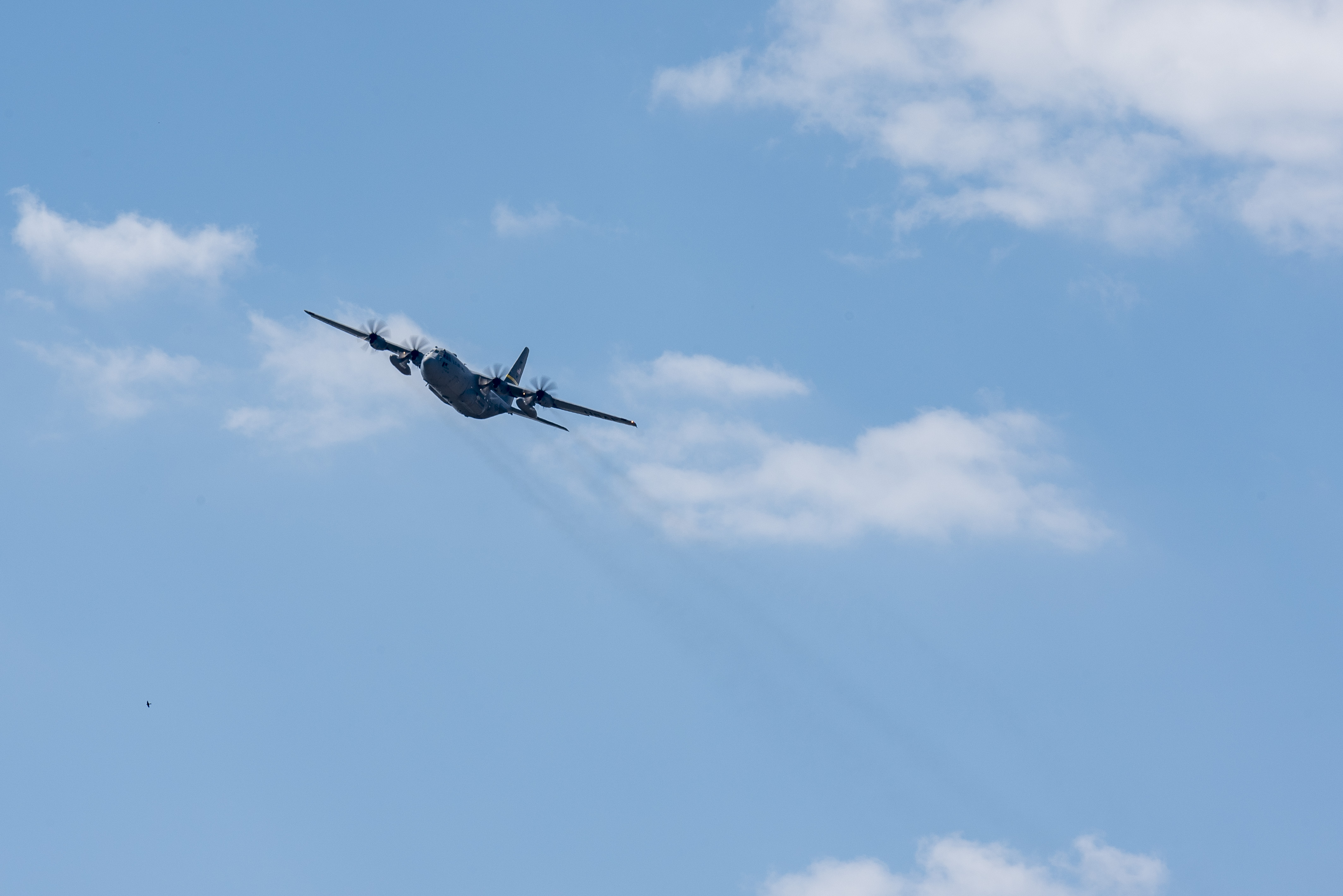 A C-130 Hercules flies over Wunstorf Air Base in Lower Saxony during Exercise Air Defender 2023