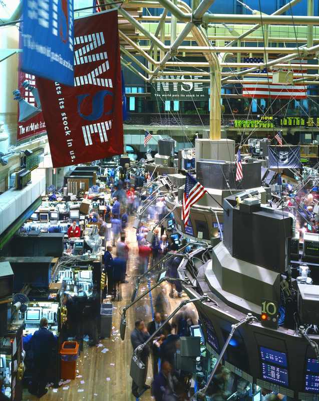 New York Stock Exchange trading floor illustrating the Dow Jones, S&P 500 and Nasdaq market close