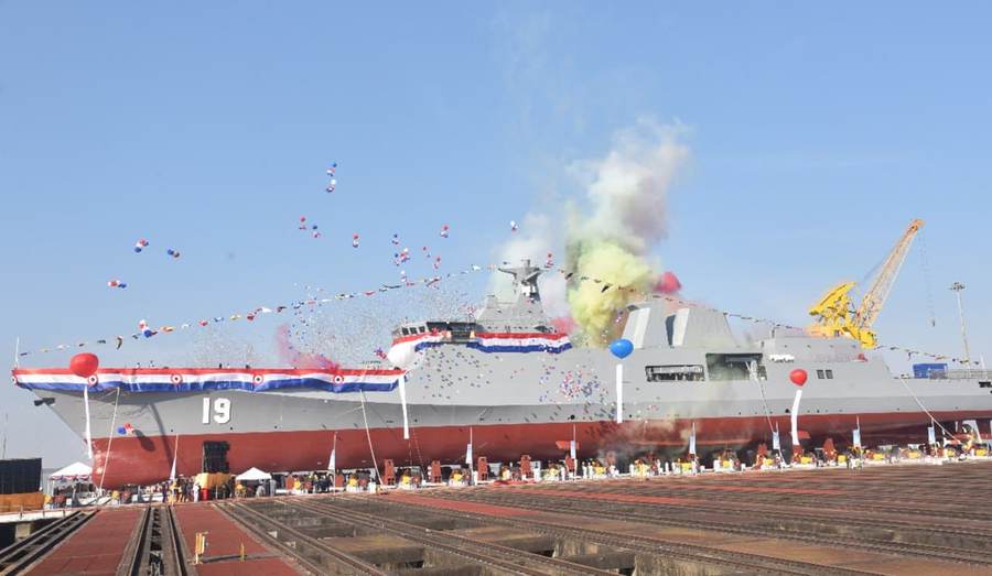 Myanmar navy frigate at sea — three navy vessels carried 1,476 Myanmar returnees from Malaysia into Myanmar waters