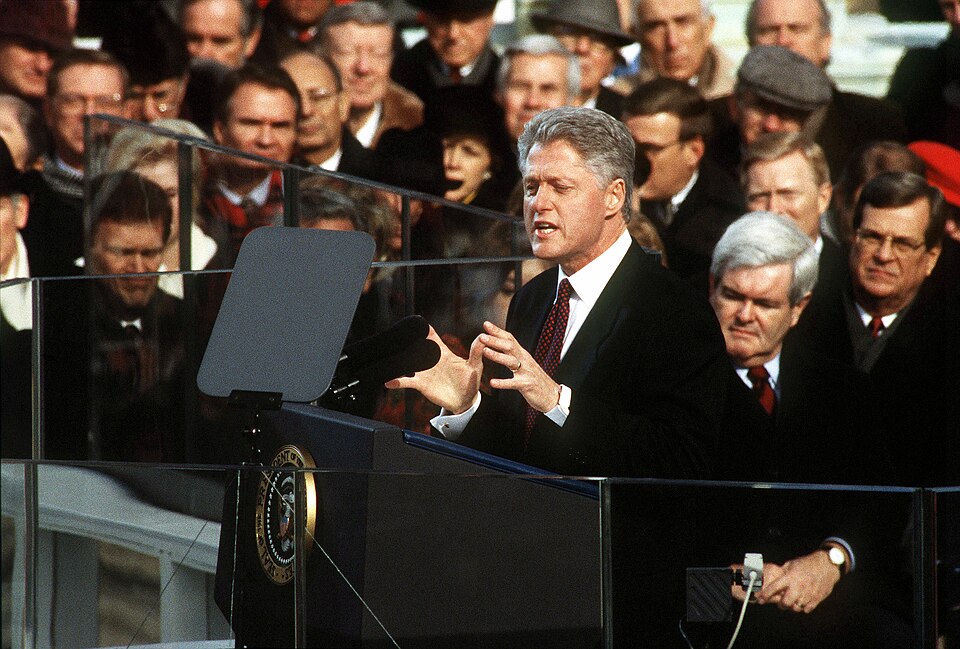 Bill Clinton delivering a speech with a teleprompter at his 1997 inauguration