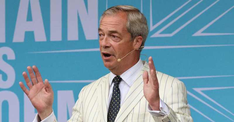 Nigel Farage addresses a Reform UK rally