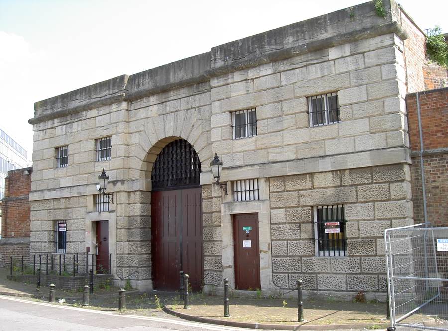 Gates of Gloucester Prison, England — UK prisoner early release scheme 2026