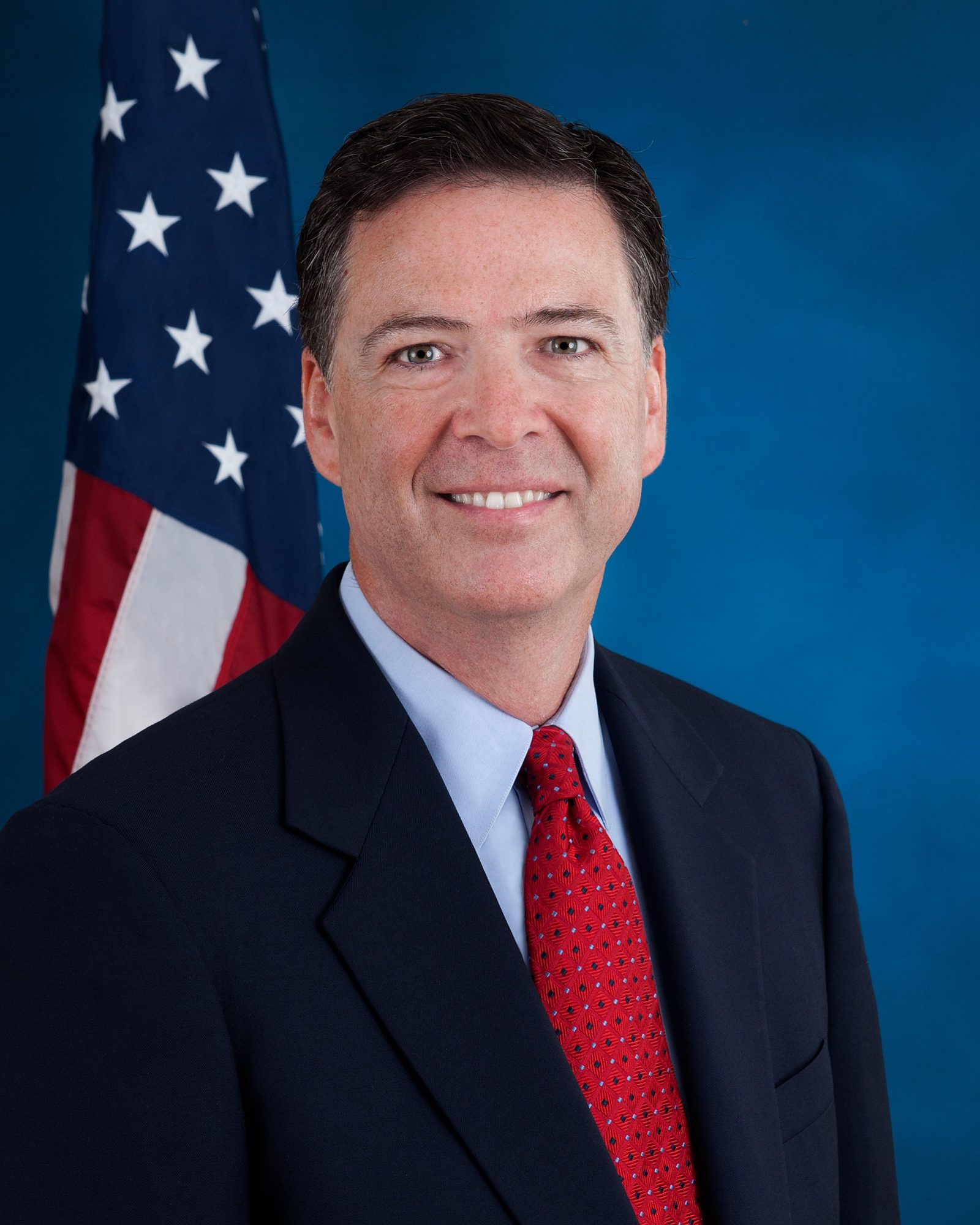 Official portrait of James Comey, the FBI director now charged a third time in an Espionage Act case over a 2016 leak