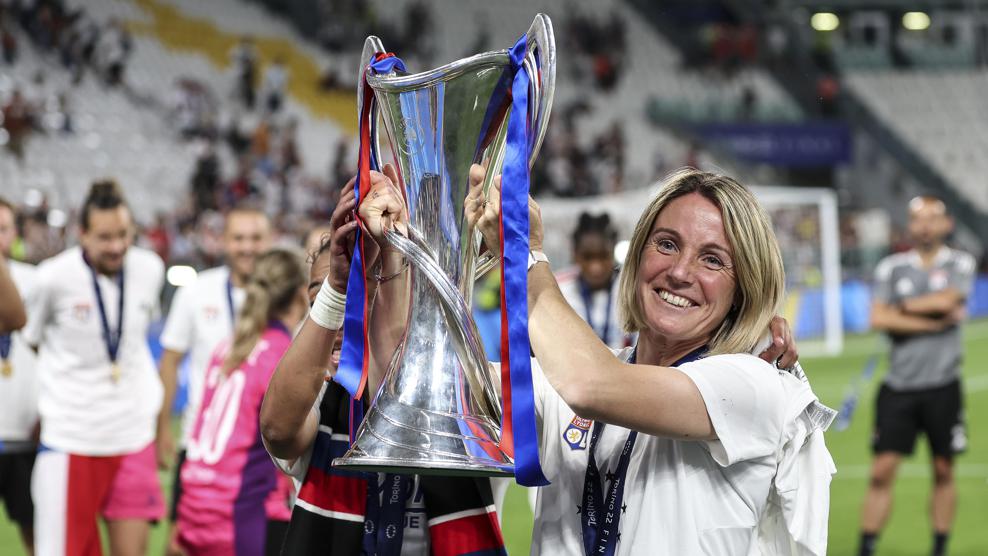 Lyon players celebrate on the field after a UEFA Women’s Champions League final