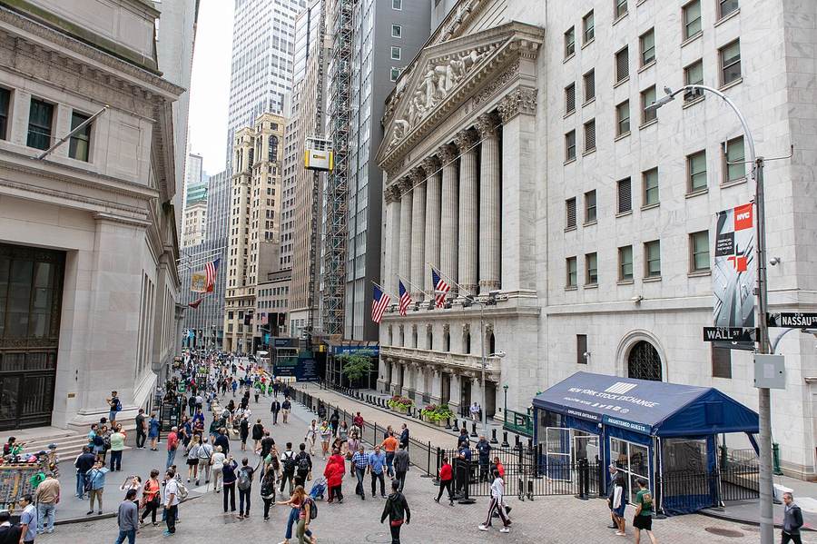 Wall Street in New York's financial district — a CEO succession at Goldman Sachs sets the tone for global finance