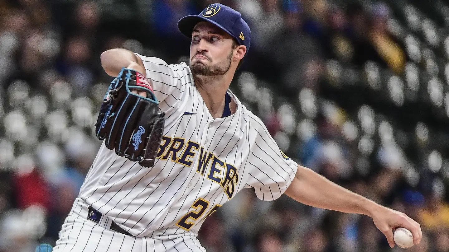 Aaron Ashby pitching for the Milwaukee Brewers; Ashby threw 2 1/3 perfect relief innings in World Series Game 4 and extended his scoreless postseason streak to 18 innings
