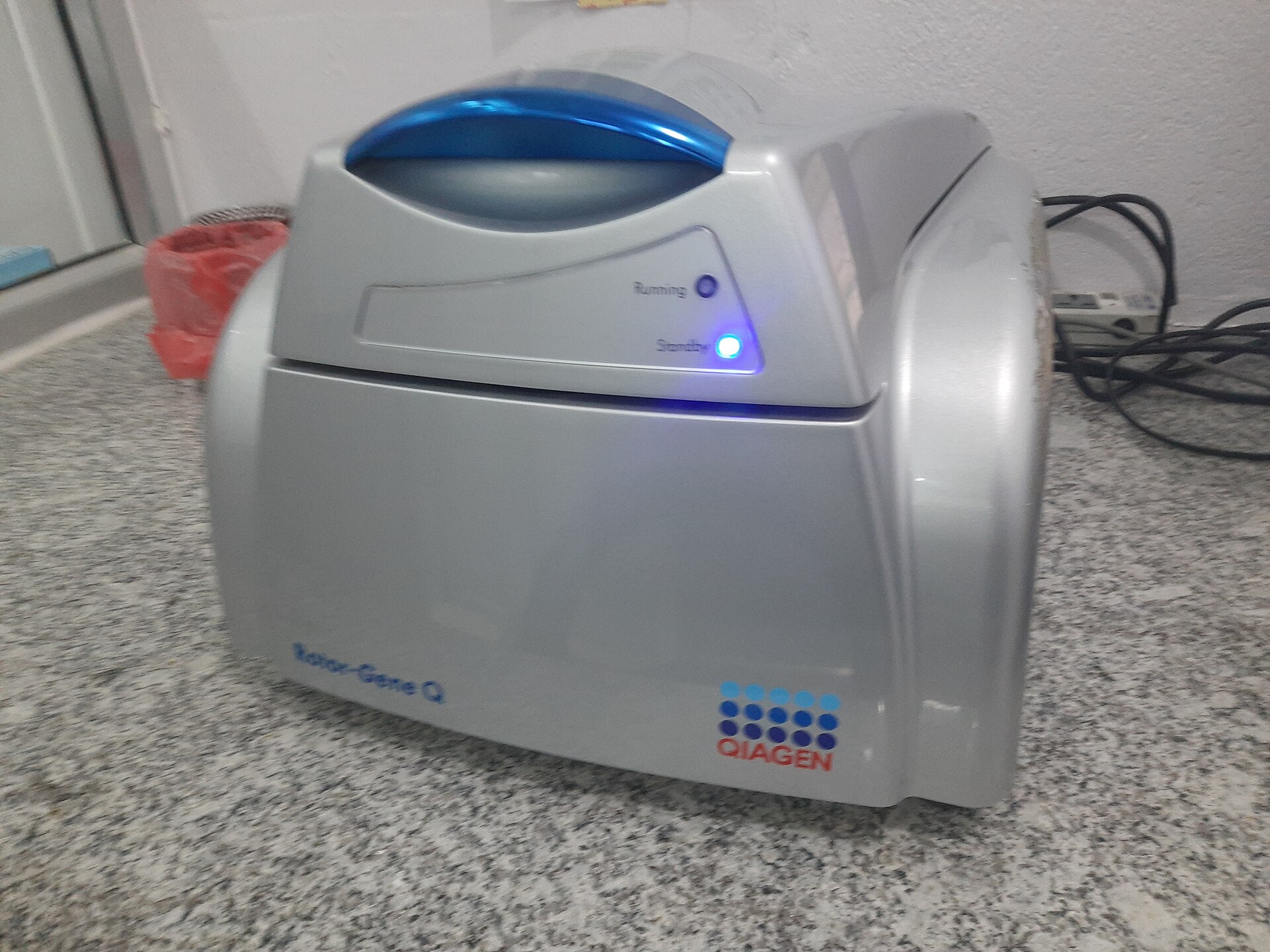A Qiagen Rotor-Gene Q real-time PCR thermocycler on a laboratory bench — EQT Qiagen acquisition