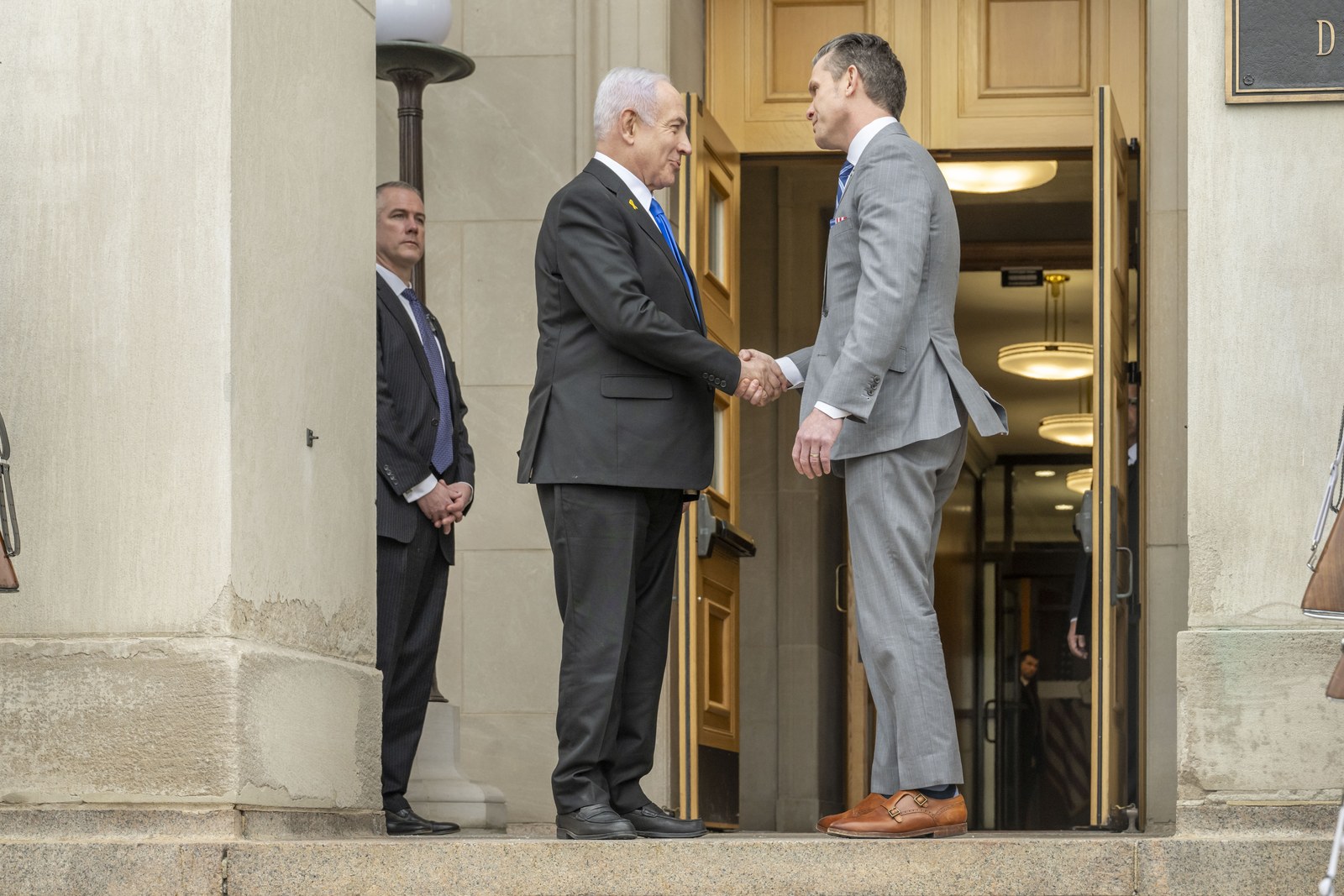 Benjamin Netanyahu with Pete Hegseth at the Pentagon, as Washington weighs Netanyahu's nuclear image post and the Iran standoff