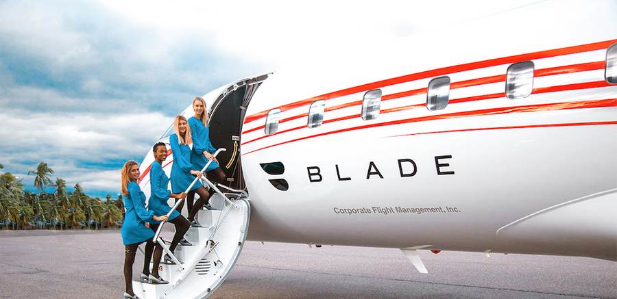 BladeOne passenger jet parked on the apron for New York to South Florida service