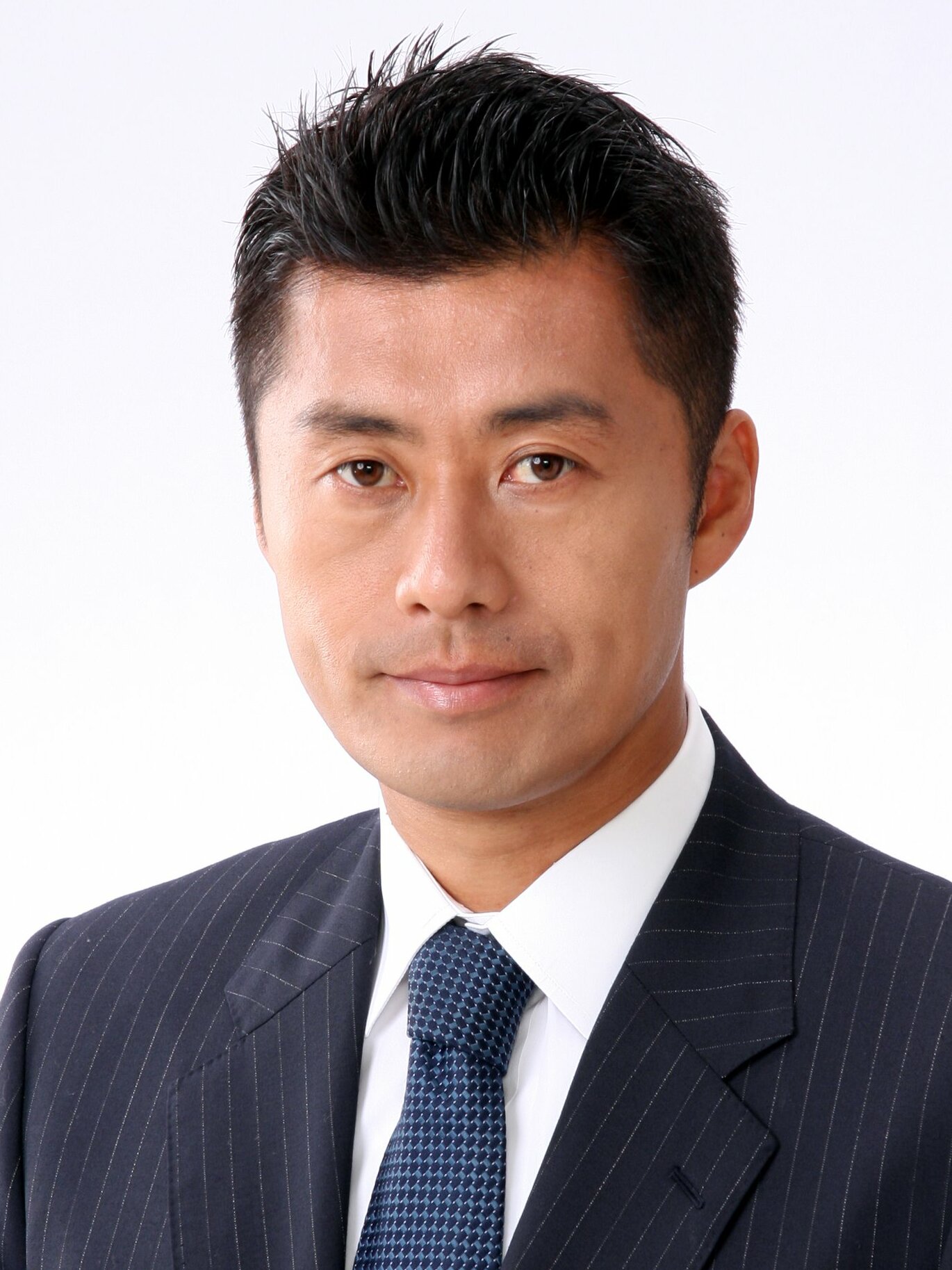 Goshi Hosono, Japan's minister in charge of disaster prevention, in an official portrait, as he prepares to issue the Japan stockpile food and water emergency request