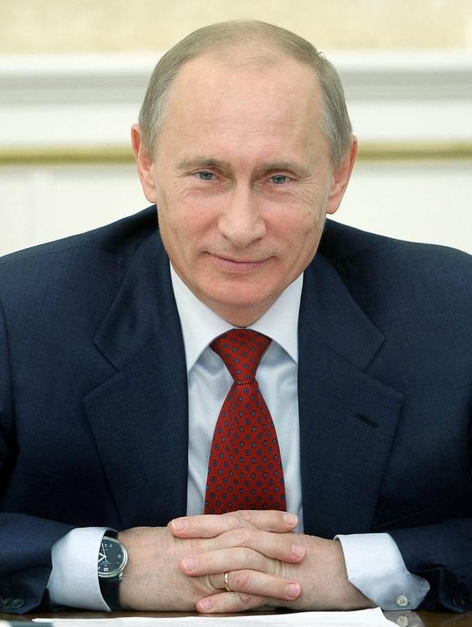 Russian President Vladimir Putin in a file photograph, as he told reporters at St. Petersburg's United Cultures Forum that all Ukraine peace proposals remain on the table