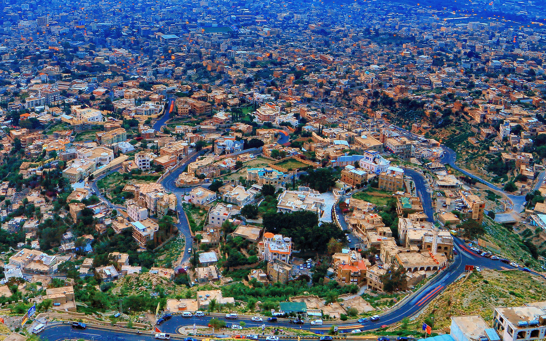 Taiz, Yemen, from above — the city's districts and roads spread across the foothills below Jabal Sabir