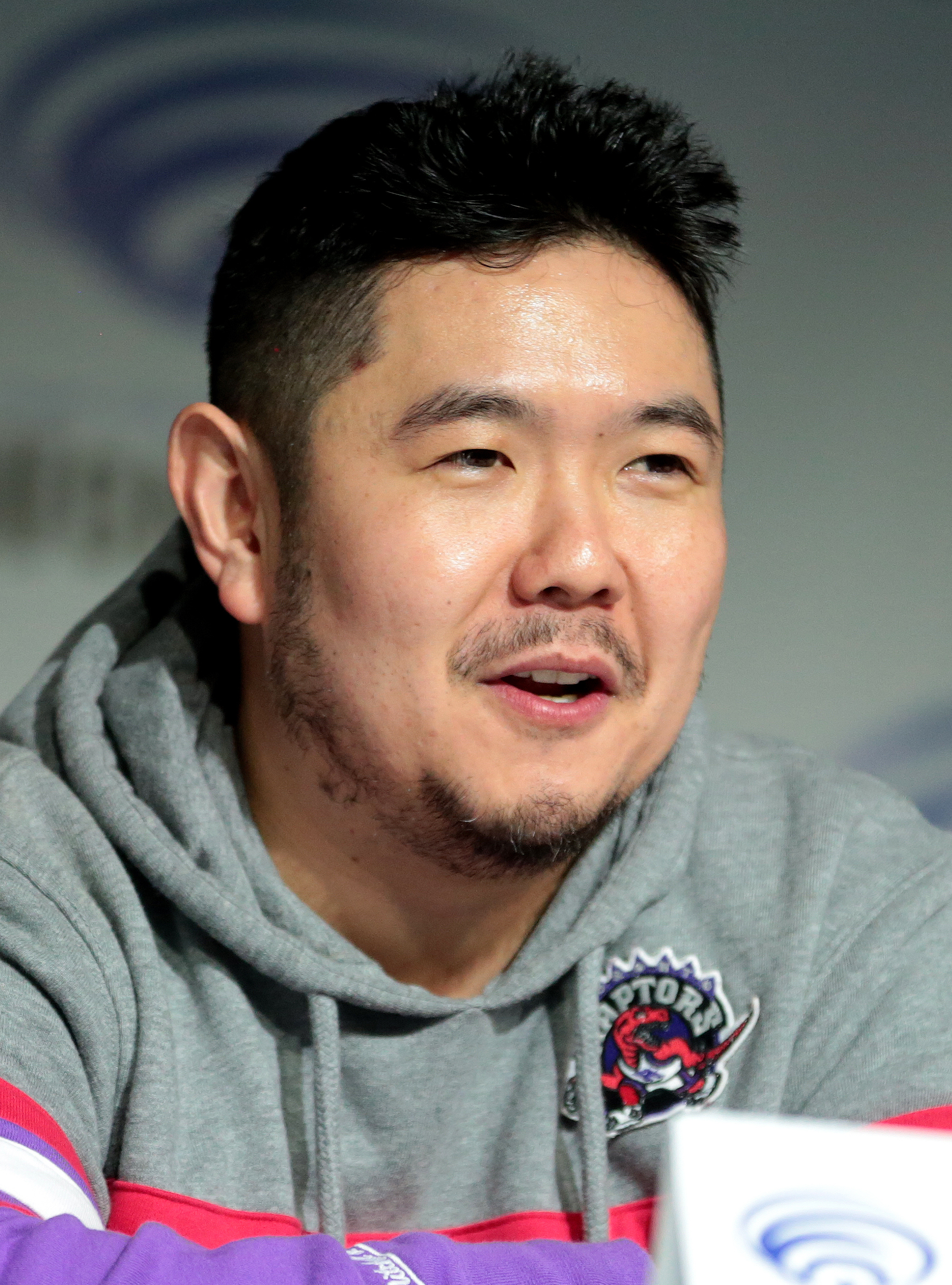 Eric Bauza in a Toronto Raptors hoodie at WonderCon 2018 in Anaheim, two years before becoming the official Looney Tunes voice