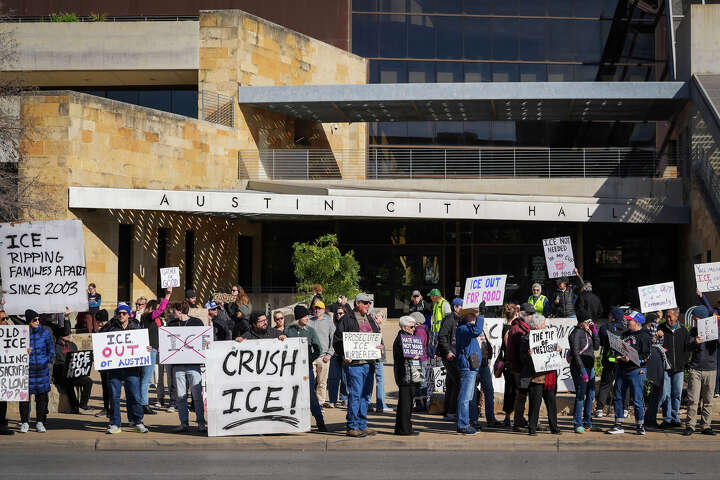 People at an earlier Austin protest against ICE enforcement