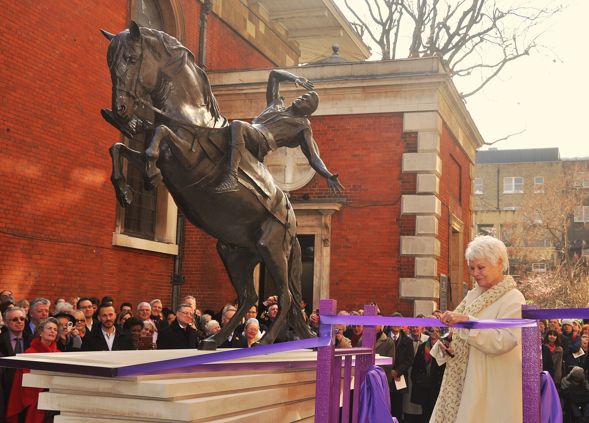 Judi Dench unveiling The Conversion of St Paul statue at St Paul's Covent Garden in London