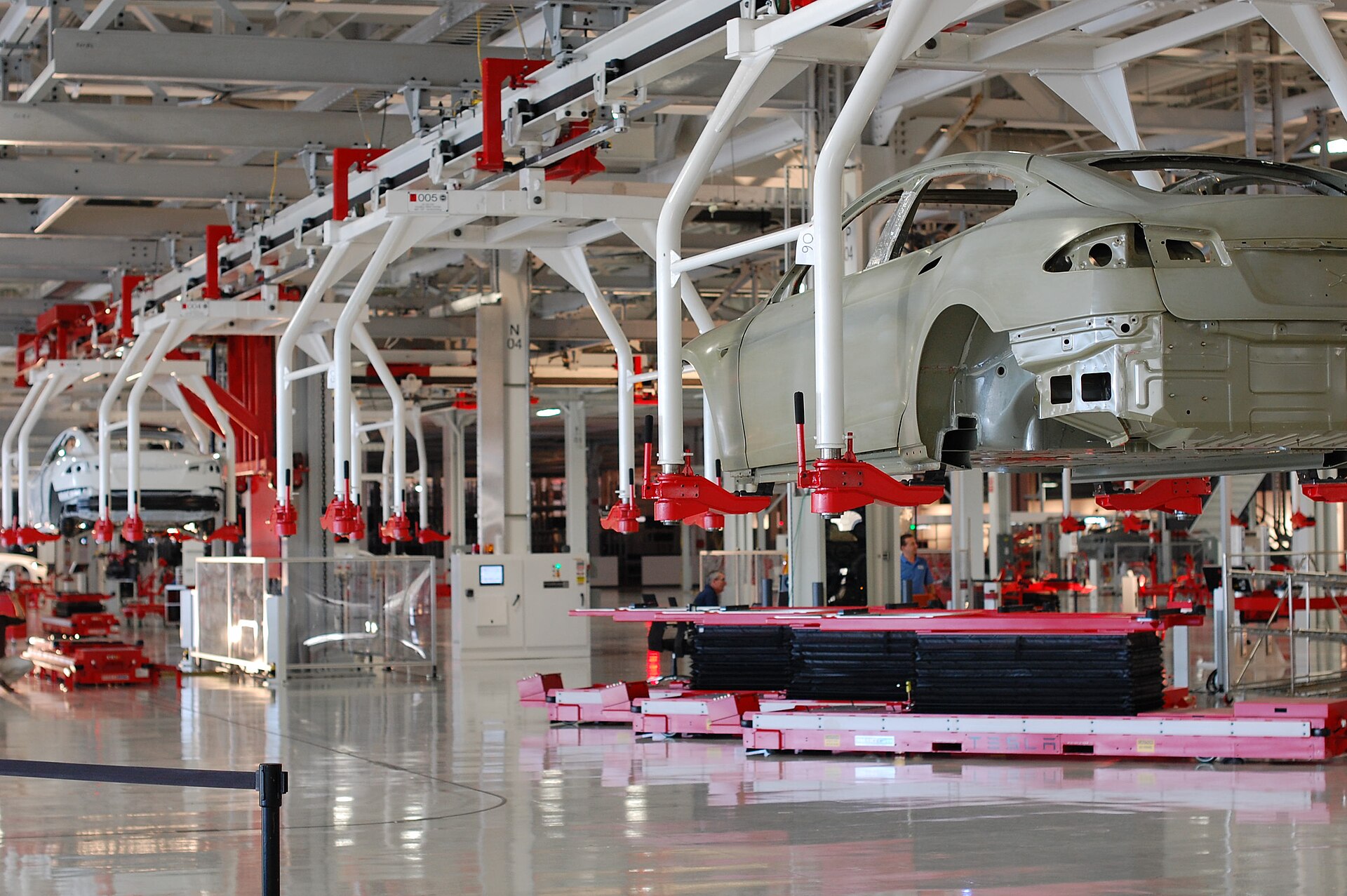 Inside Tesla's factory in Fremont, California, car bodies on the assembly line — file photo for Tesla SpaceX merger talks