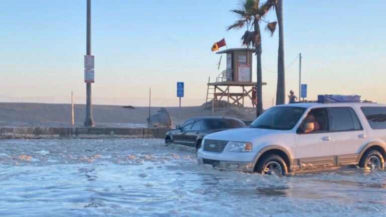 File photograph of coastal flooding at Balboa Peninsula in Orange County, illustrating Hurricane Rachel flood risk