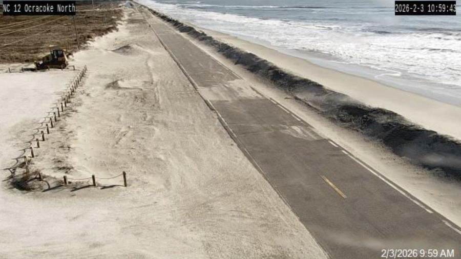 Storm surf washing across damaged NC Highway 12 on Pea Island during the September nor'easter