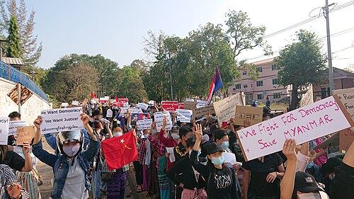 Anti-coup demonstrators in Hpa-An, Myanmar, in February 2021 illustrating the protests followed by mass political detention