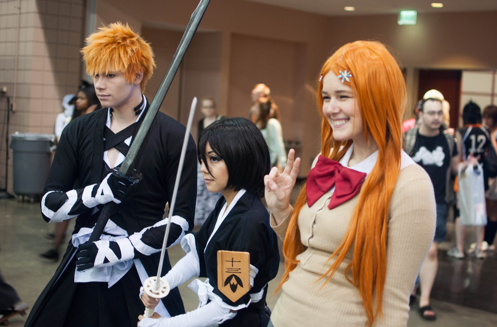 Bleach cosplayers as Ichigo Kurosaki, Rukia Kuchiki and Orihime Inoue at Anime Weekend Atlanta 2014, the fan culture around the Bleach anime finale