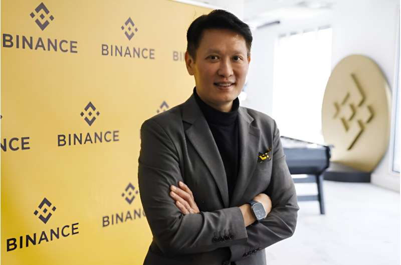 Binance chief executive Richard Teng photographed in front of a Binance backdrop