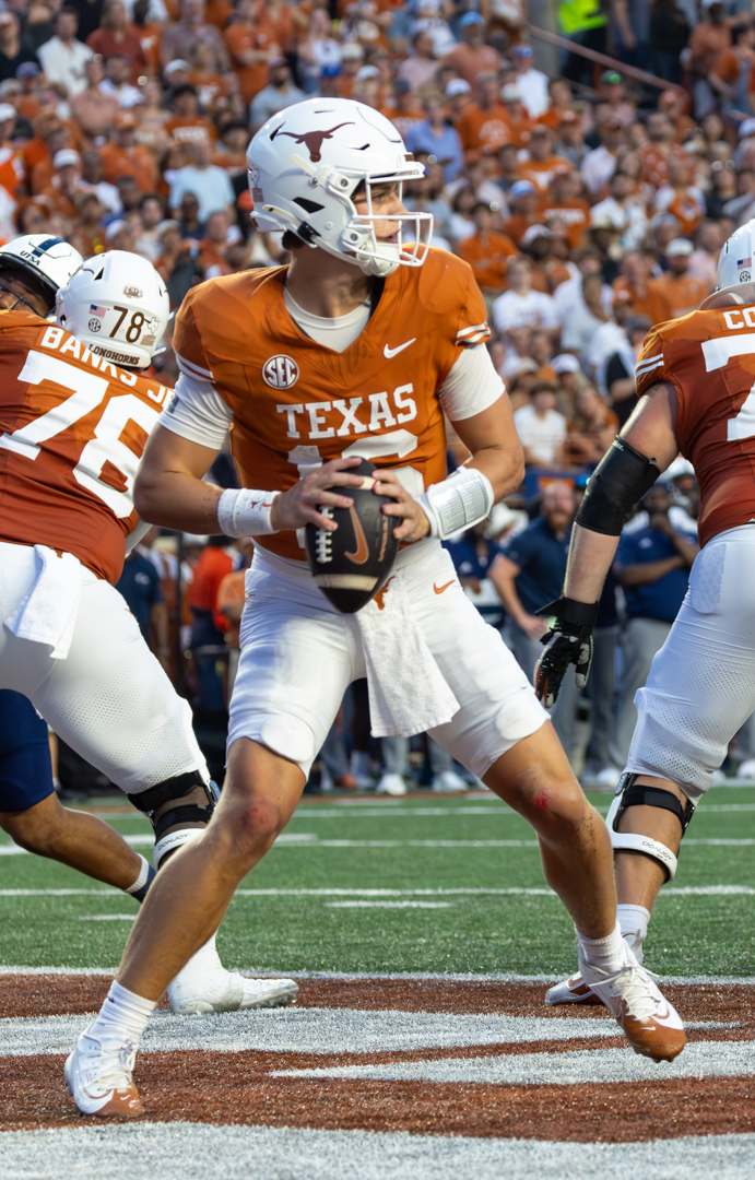 Arch Manning of the Texas Longhorns, who scored three touchdowns in the Texas vs Ole Miss final score of 34-27