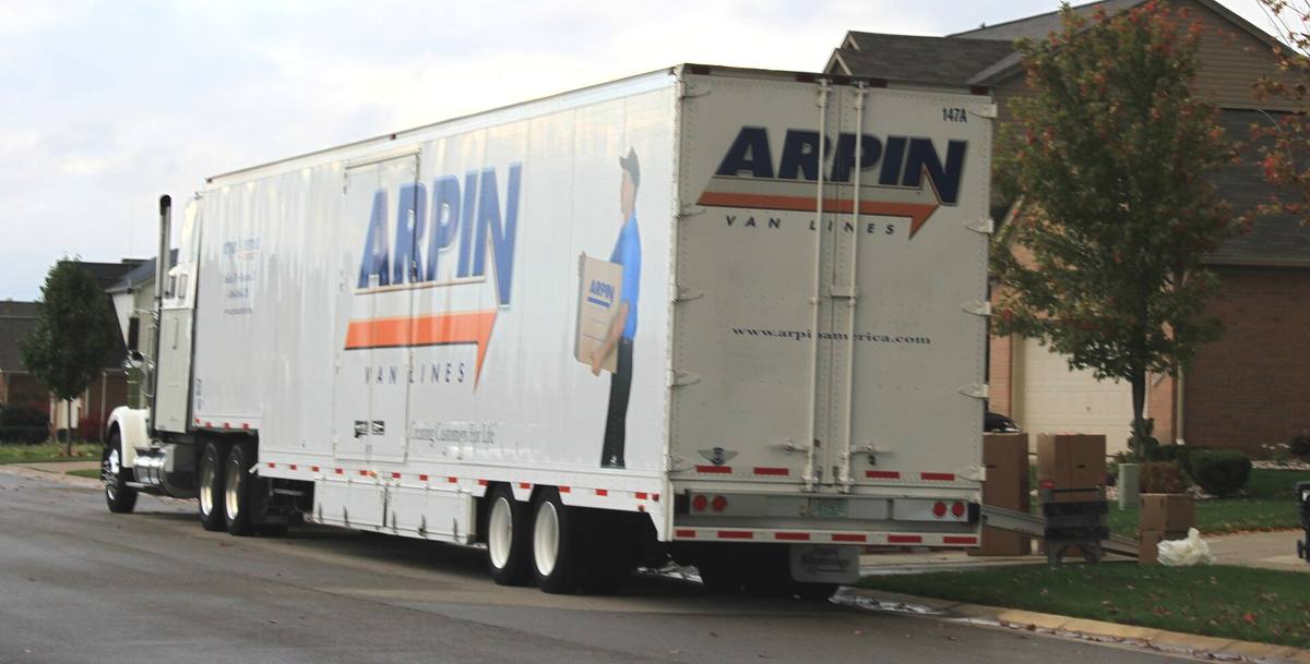 A moving van ready for a household move between homes