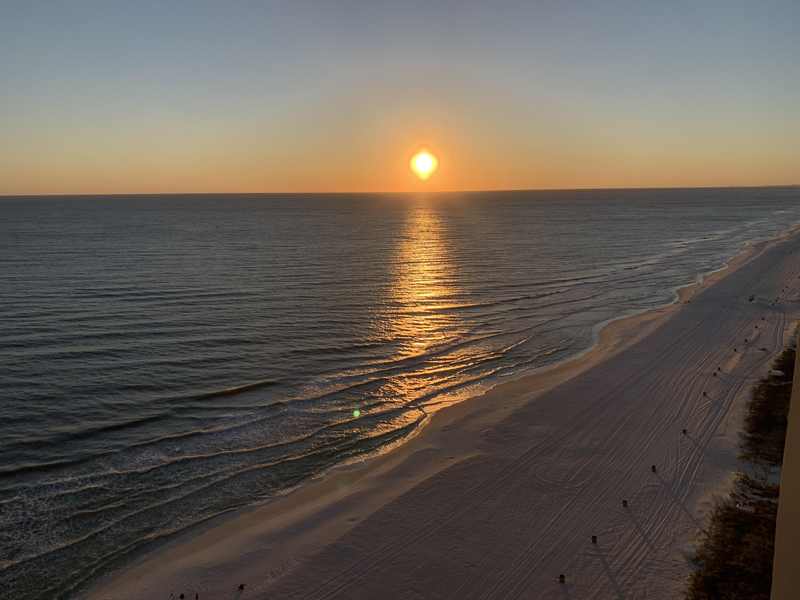 Beach in Destin, Florida at sunset — coastal Destin sits in Okaloosa County's evacuation Zones A and B
