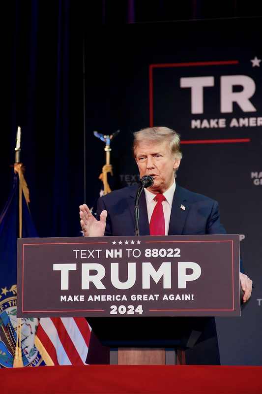 President Donald Trump speaking at a rally before clarifying his 'take out Los Angeles' remark about Iran and gas prices