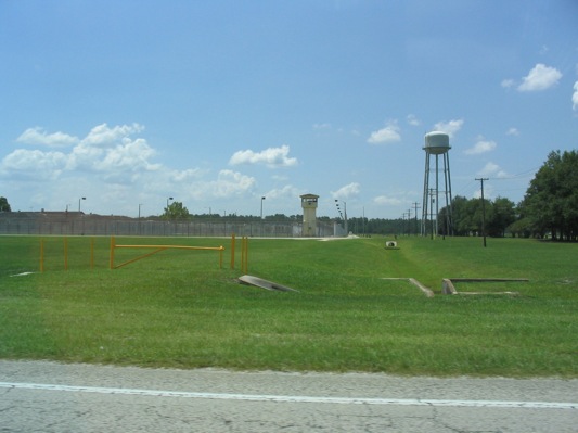 The perimeter fence, watchtower and water tower at the Raiford prison complex in Florida, near where the William Reaves Florida execution was carried out