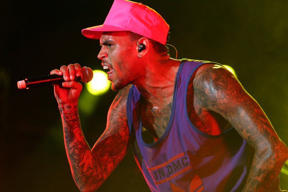 Chris Brown performing on stage in a file photo, as the Chris Brown sentencing in London ends with a suspended term for the nightclub attack