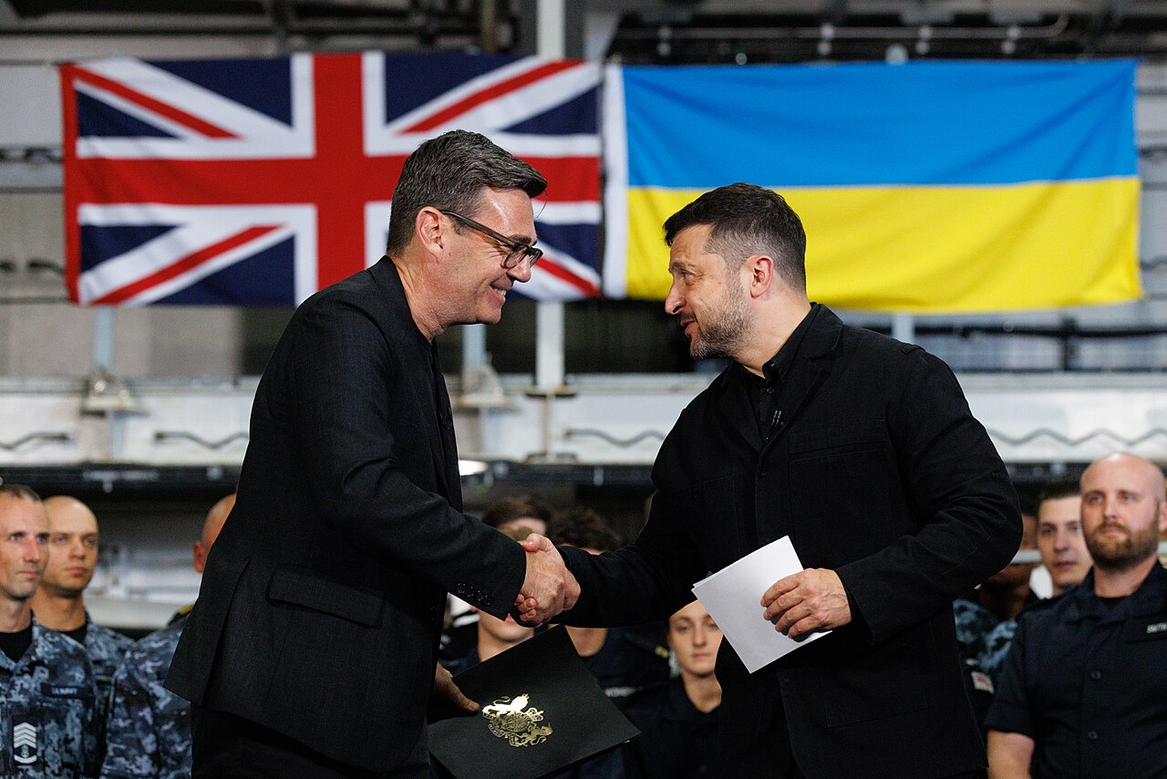 Bessent warns Zelenskyy Starlink dispute — President Zelenskyy shaking hands with Prime Minister Burnham aboard HMS Queen Elizabeth in Portsmouth