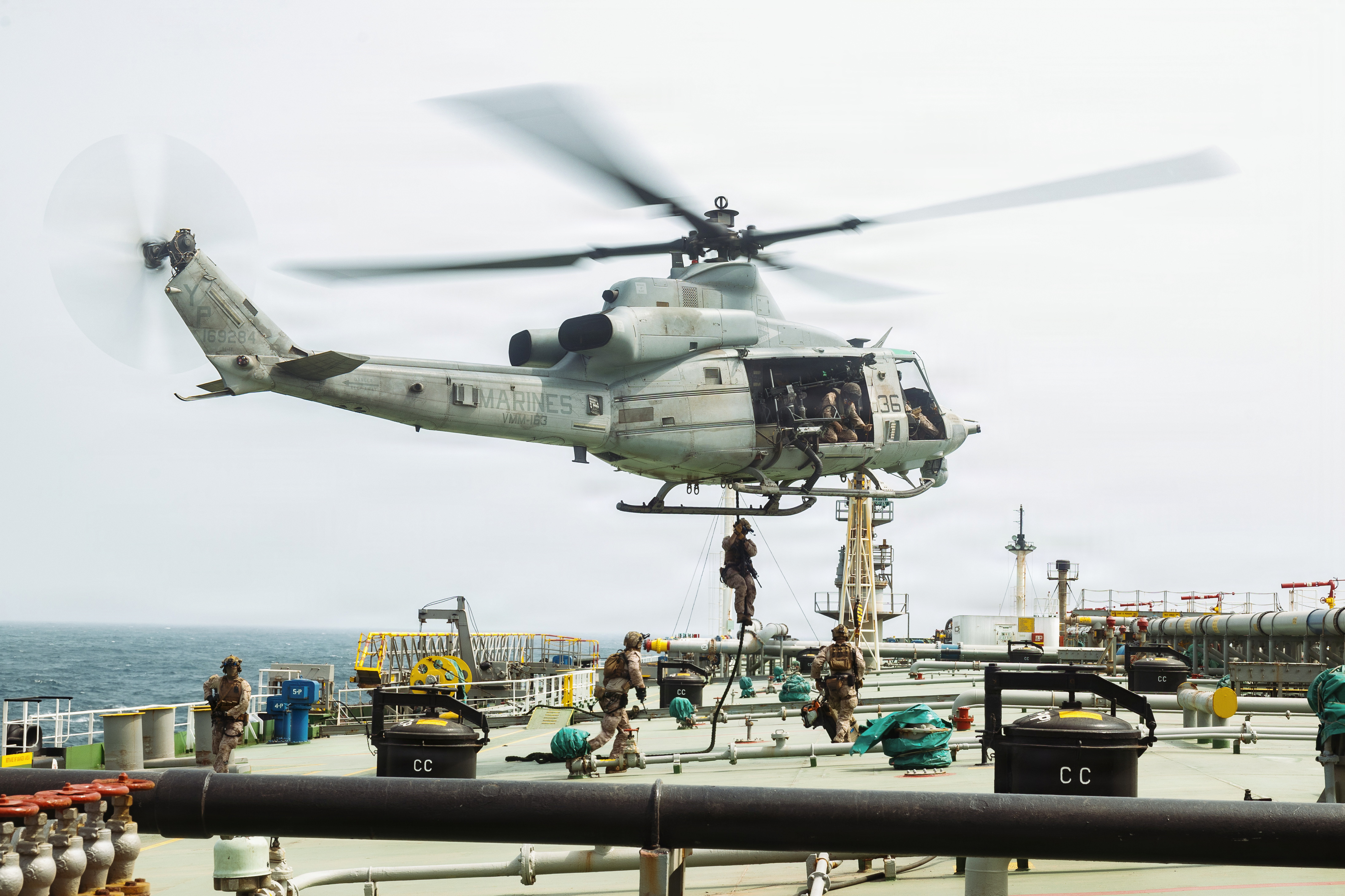U.S. Marines from the 11th Marine Expeditionary Unit conducting a verification boarding of a merchant vessel in the Gulf of Oman