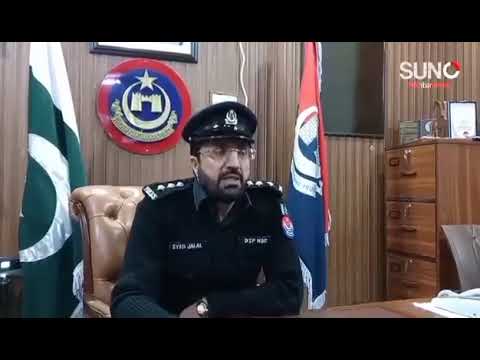 A Pakistani police official speaking from an office