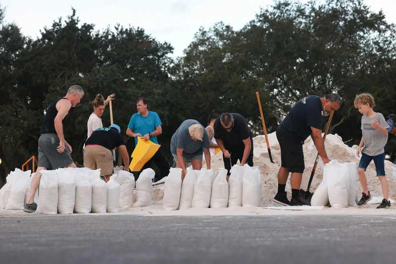Florida residents filling sandbags ahead of a hurricane in a 2024 file photograph