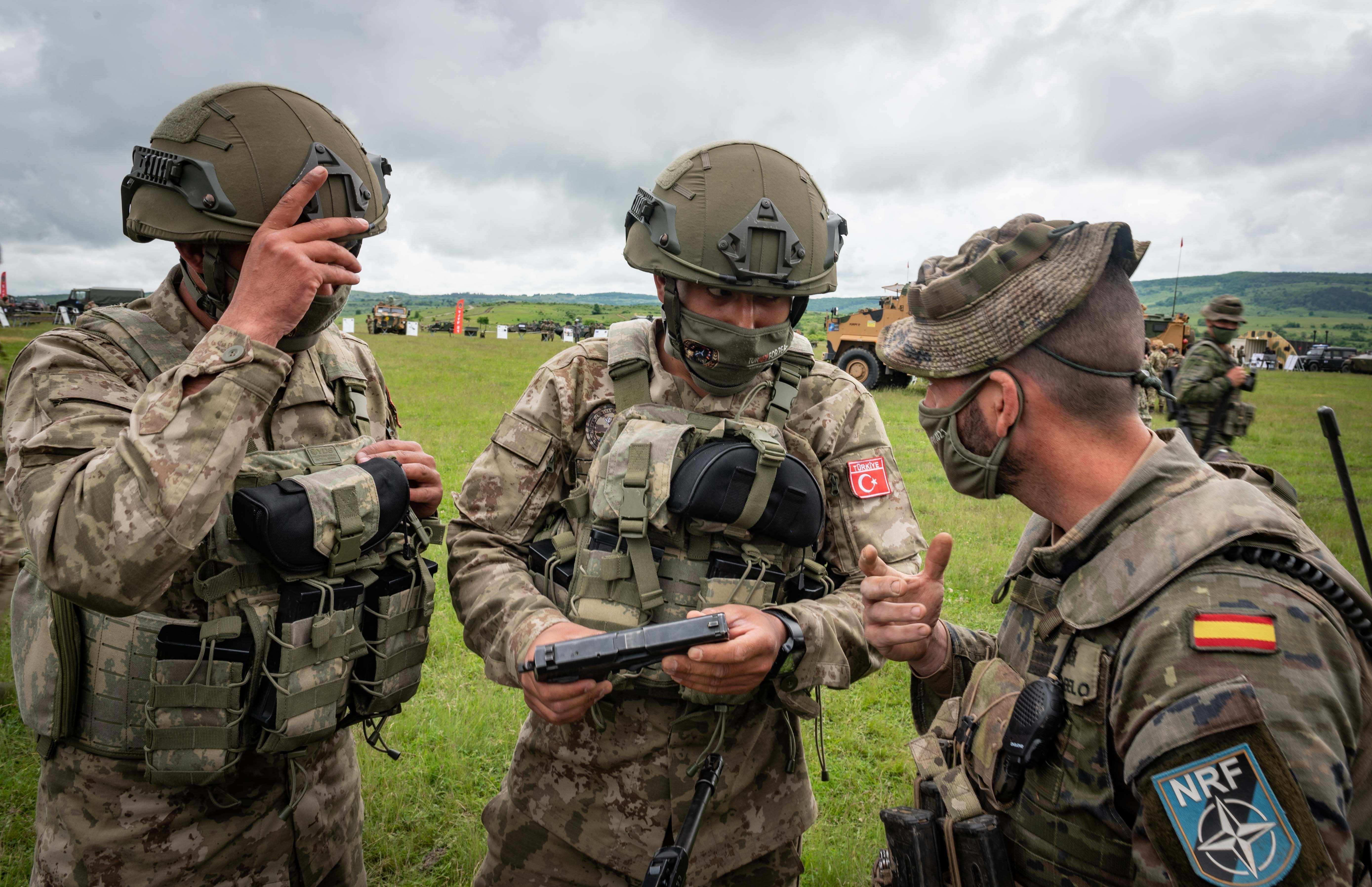 Badr defence pact Turkey NATO second largest army — Turkish troops at a NATO exercise equipment display