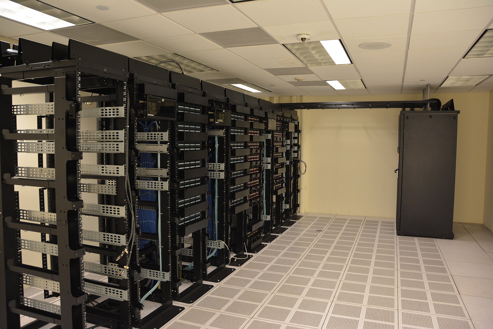 Rows of data center server racks — Galaxy servers are the product the Tenstorrent $6.2 billion valuation funding is meant to scale