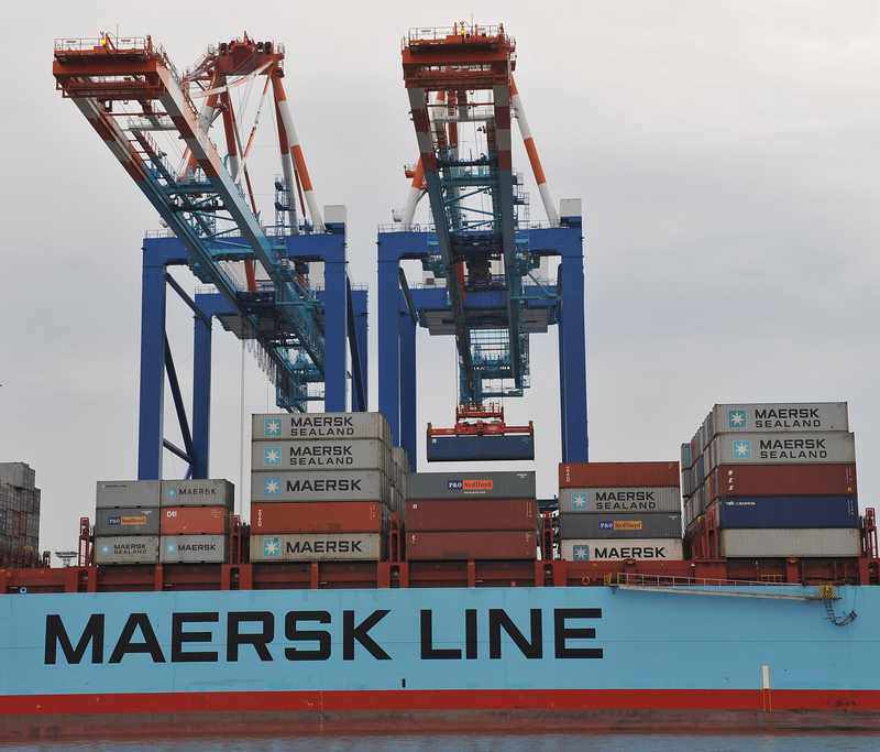 Container cranes illustrating China overcapacity tariffs and cross-border industrial exports