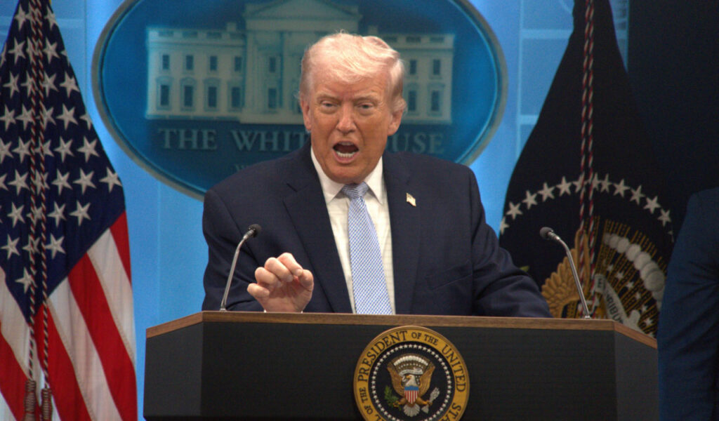 President Donald Trump speaking at the White House podium, from where his administration has pressed Ukraine to settle the war and argued Russia holds the stronger position