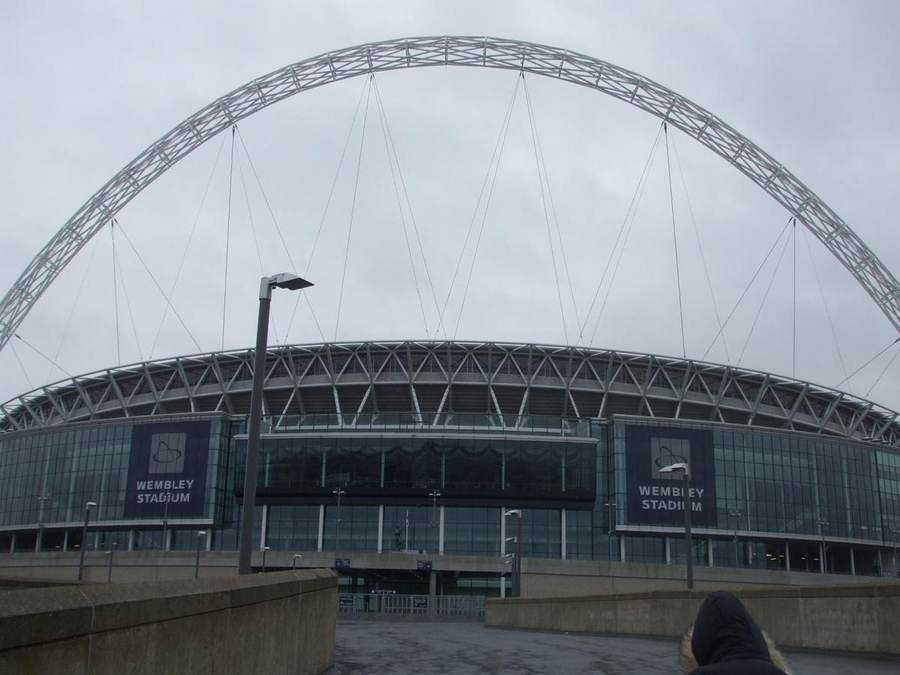 Wembley Stadium under floodlights, shown as a contextual image for England versus Spain