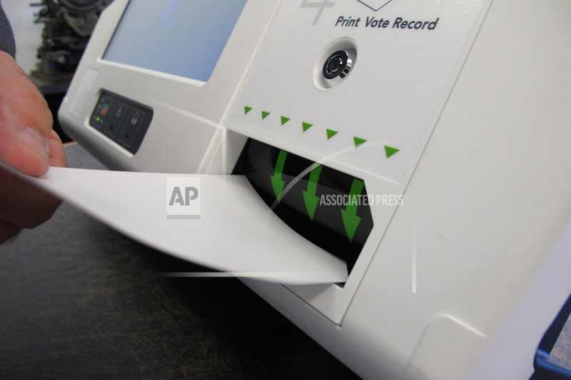 Ballot-marking device and scanner illustrating the Georgia voting machines illegal dispute over QR-code tabulation