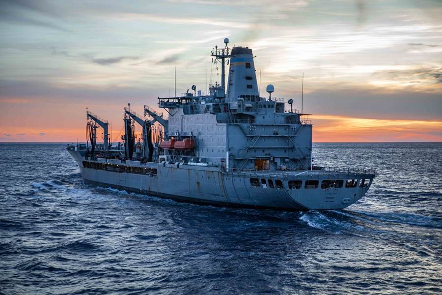 USNS Kanawha, a non-commissioned Military Sealift Command replenishment oiler, conducts a replenishment at sea — an example of a non-commissioned vessel, which unlike a USS warship is not a commissioned Navy ship