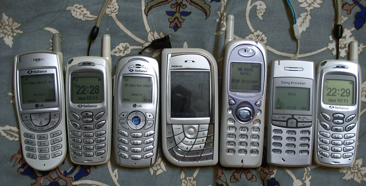 Array of mobile phones illustrating the scale of devices seized in the Zamboanga Sibugay scam hub raid