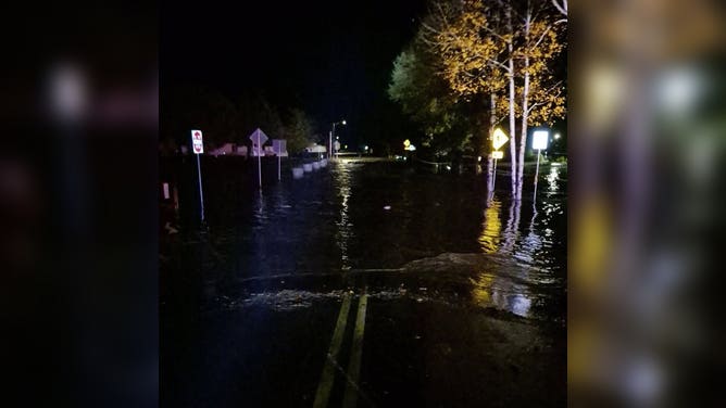 Pagosa Springs flooding October 2026 — a flooded street at night in Pagosa Springs, Colorado