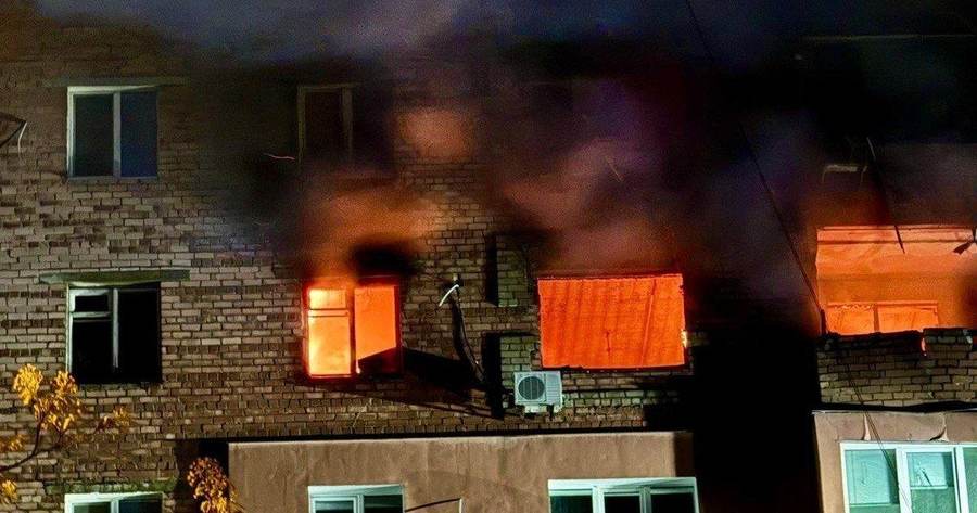 A residential building burning after an earlier Russian strike on Dnipro