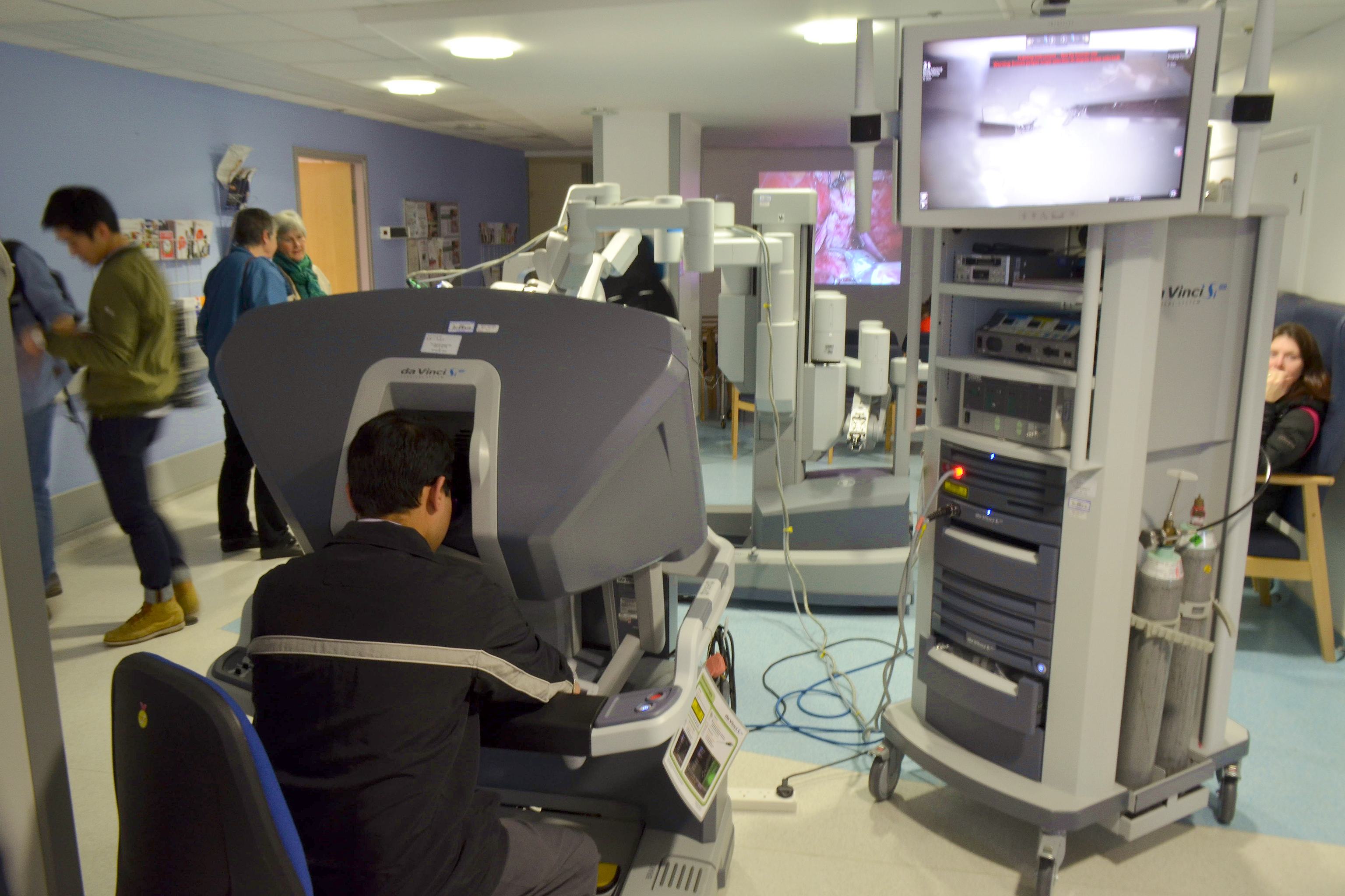 A da Vinci surgeon console and vision cart demonstrated at a science festival