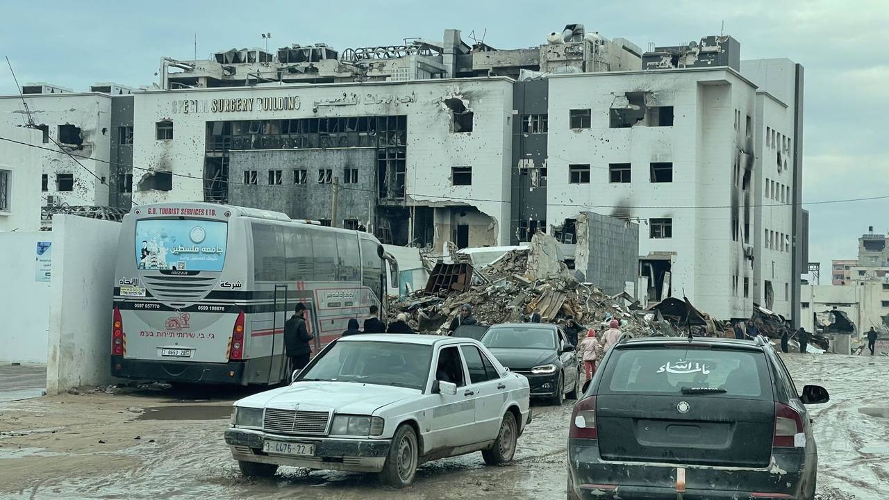 Shell-damaged Special Surgery Building of Al-Shifa Hospital in Gaza City, with rubble piled in front — the Gaza death toll 74,000 milestone was announced in September 2026