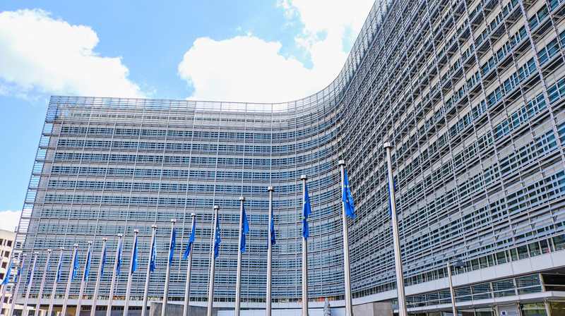 European Union flags outside the European Commission Berlaymont building as the CPC Network coordinates gaming investigations