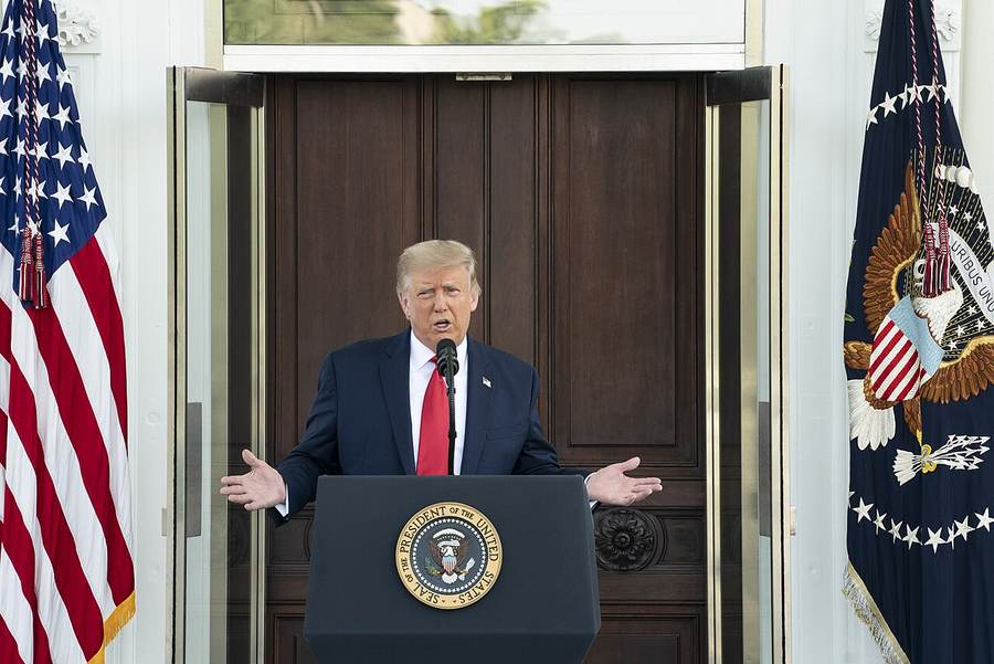 President Donald Trump at a White House press conference; TIME reports he consulted Grok before the Maduro capture